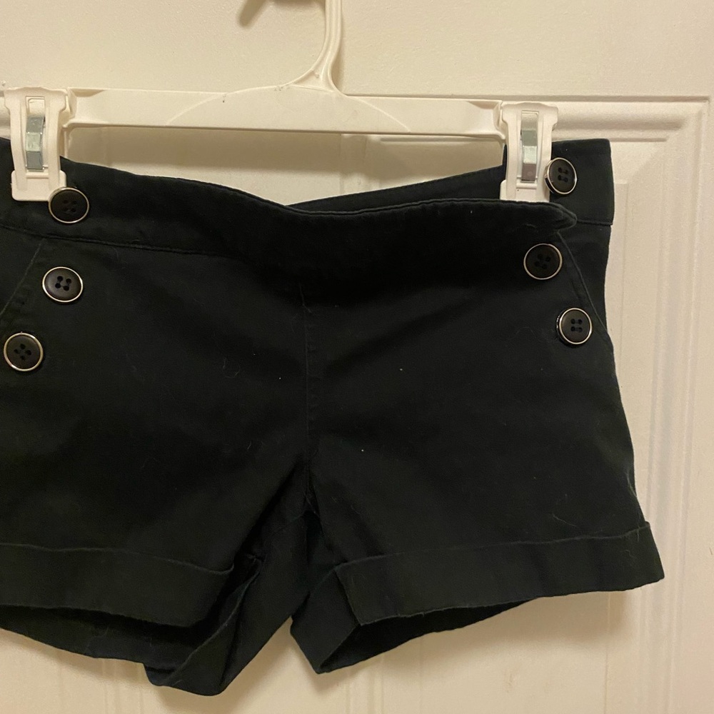 Black shorts button ton detail on sides